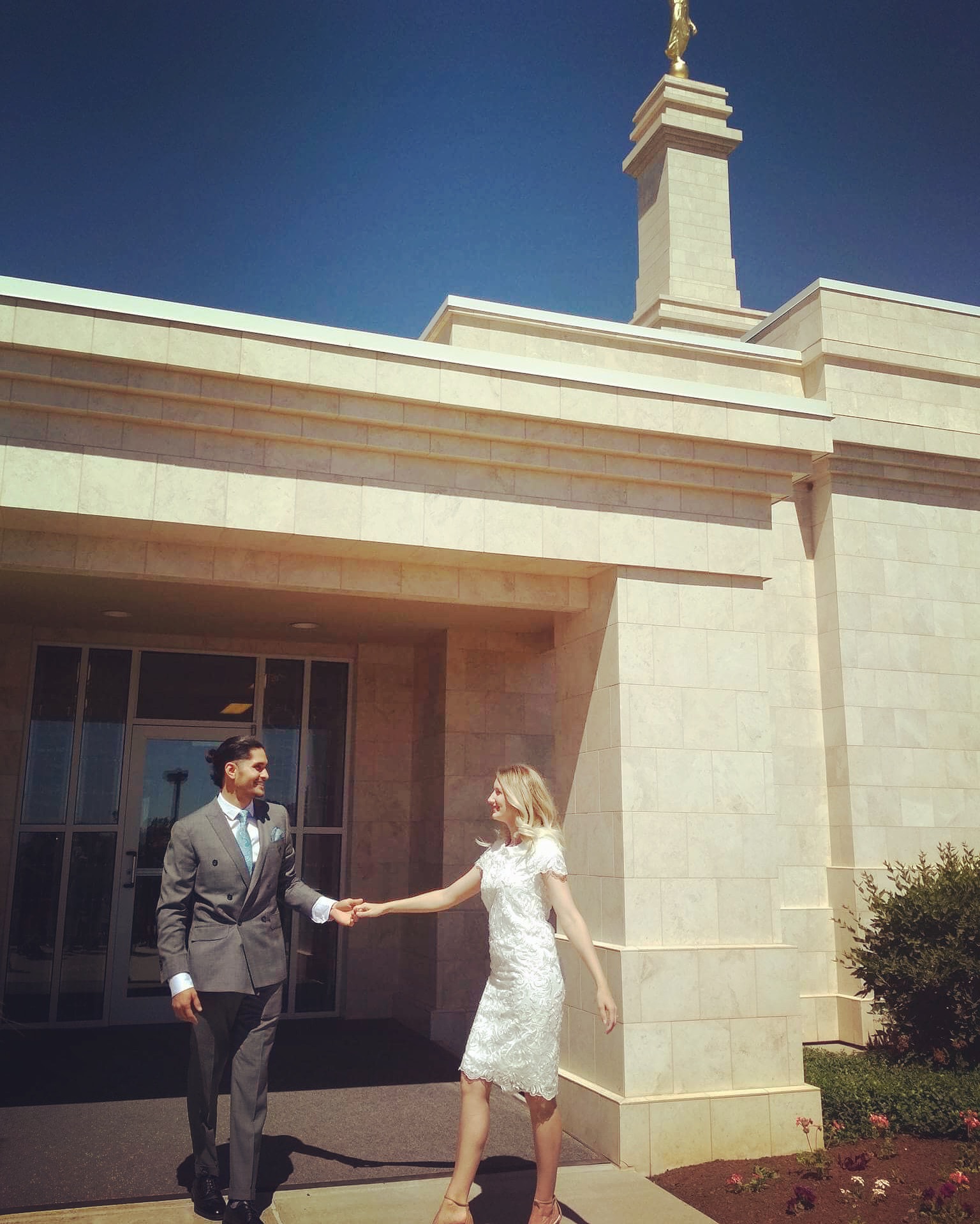 A couple outside the temple, reflecting the faith, love, and legacy behind Remembrance Rings